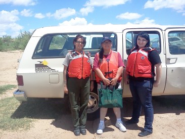 Caption. (Left to right) Nadine Carter, Army Corps of Engineer Ranger at Conchas Dam with Mesalands Community College students, Nikki Vazquez  and Sanda Garret. Mesalands students collect water samples and test for pH levels and dissolved oxygen.  The data collected will be combined with previous data provided by the Army Corps of Engineers. 
