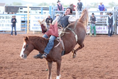 Sophomore Edmiles Harvey wins the bareback riding championship title at the first Mesalands Community College Spring Rodeo last weekend. Harvey is currently leading the Grand Canyon Region. 