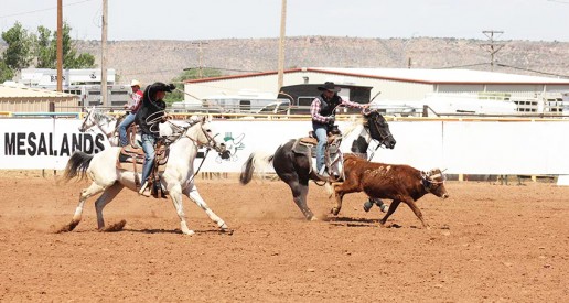 (left) Team ropers Koly Ray Spears and Jacob Rounds at the Mesalands Spring Rodeo clinch the championship title. 