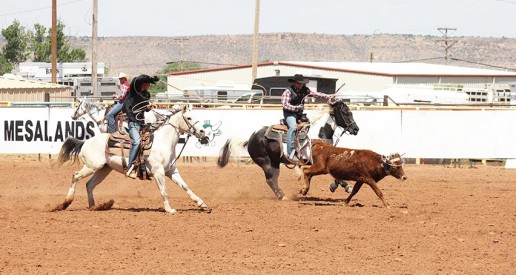(left) Team ropers Koly Ray Spears and Jacob Rounds at the Mesalands Spring Rodeo clinch the championship title.
