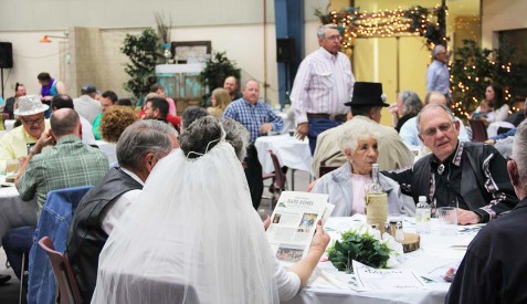 Attendees to the ‘Til Death Do Us Part fundraiser at the North American Wind Research and Training Center, socialize as they begin their quest to identify the murderer. 