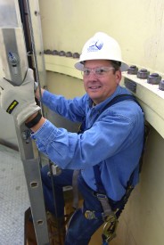 Dr. Thomas W. Newsom pauses for a quick photo as he climbs the nearly 300 foot wind turbine at the Mesalands’ North American Wind Research and Training Center. 