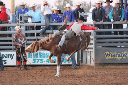 Scott Bevins, a member of the Mesalands Rodeo Team, wins the reserve championship title in bareback riding last weekend.